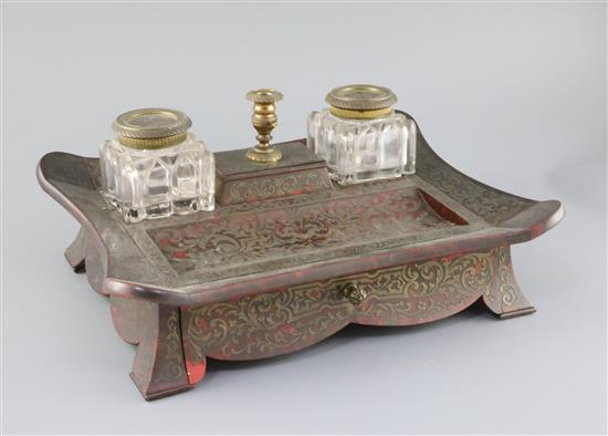 A mid 19th century red boulle work inkstand, width 14in. depth 11.25in. height 6in.